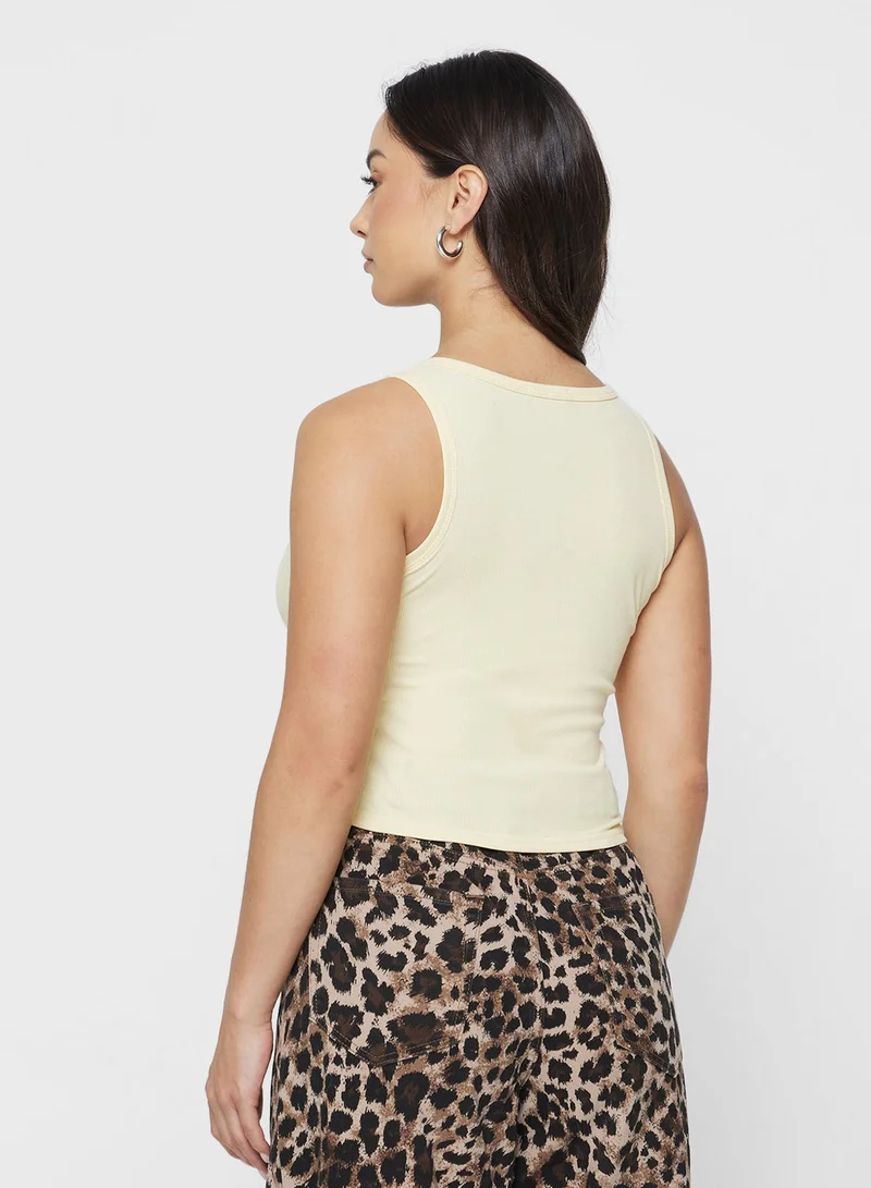 جينجر بيسيكس بلوزة بدون أكمام مضلعة صلبة