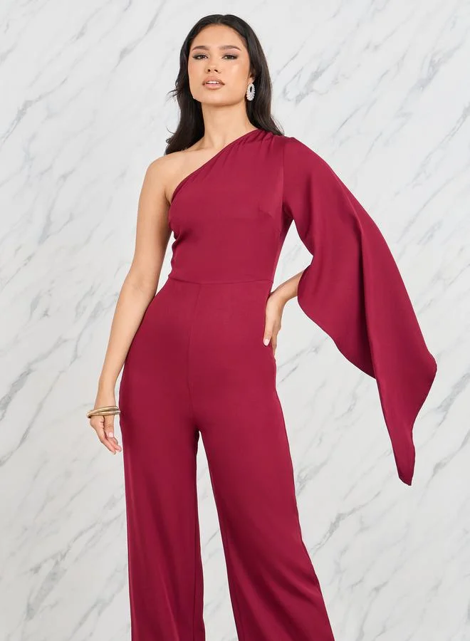 ستايلي One Shoulder Neck Cape Sleeves Wide Leg Tailored Jumpsuit