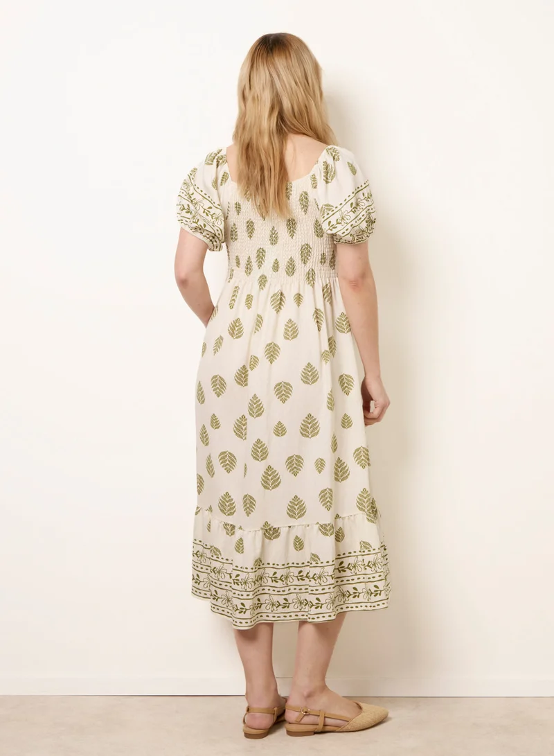 بلو فانيلا Square Neck Puff Sleeve Shirred Border Midi Dress