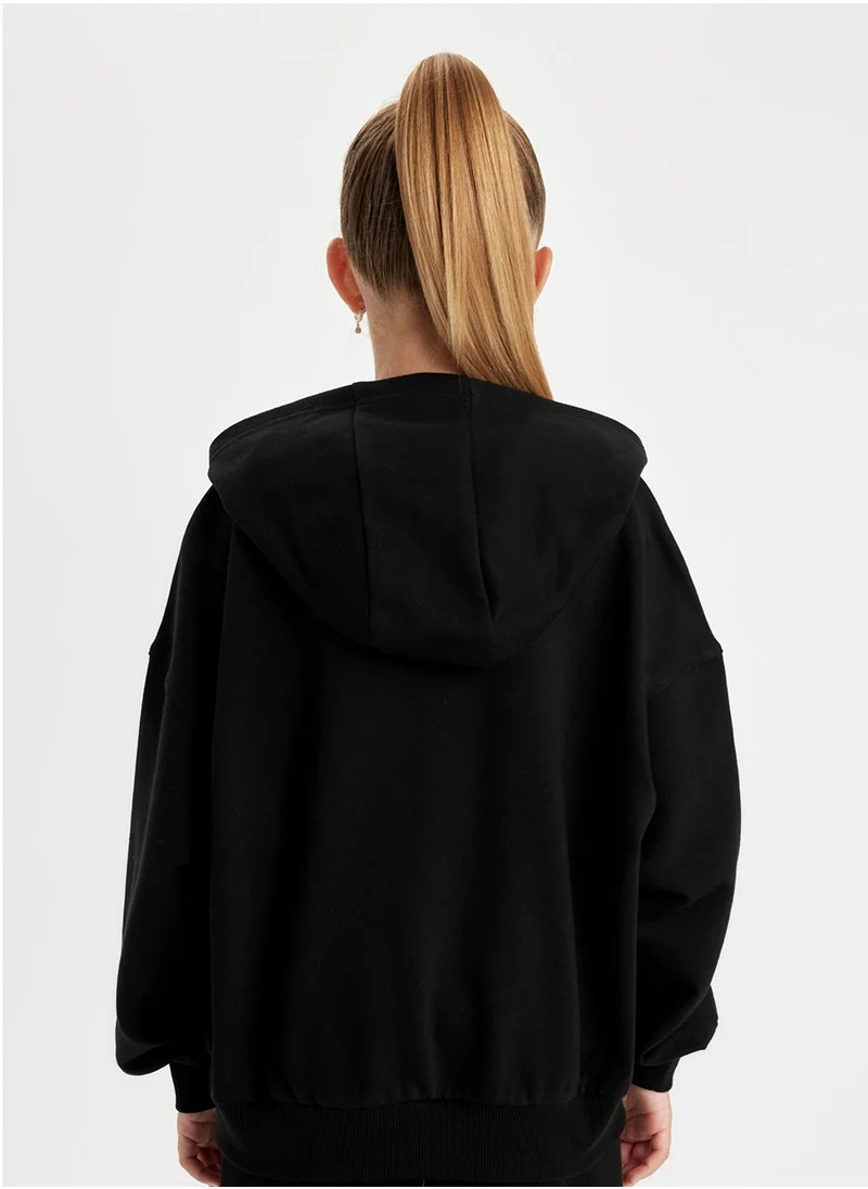 ديفاكتو Black Oversized Fit Hooded Text Printed Sweatshirt