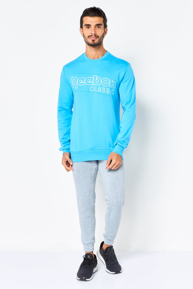 Reebok Men Sportswear Fit Embroidered Logo Outdoor Sweatshirt, Blue - Image 4