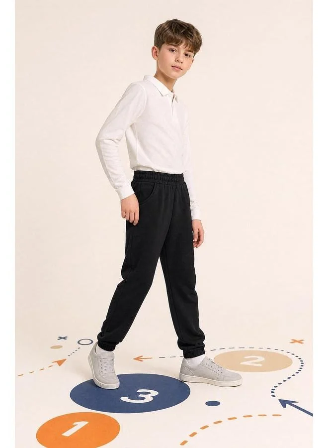 Perendi Elastic Comfortable Fit Pocket Unisex Sweatpants for Boys and Girls.