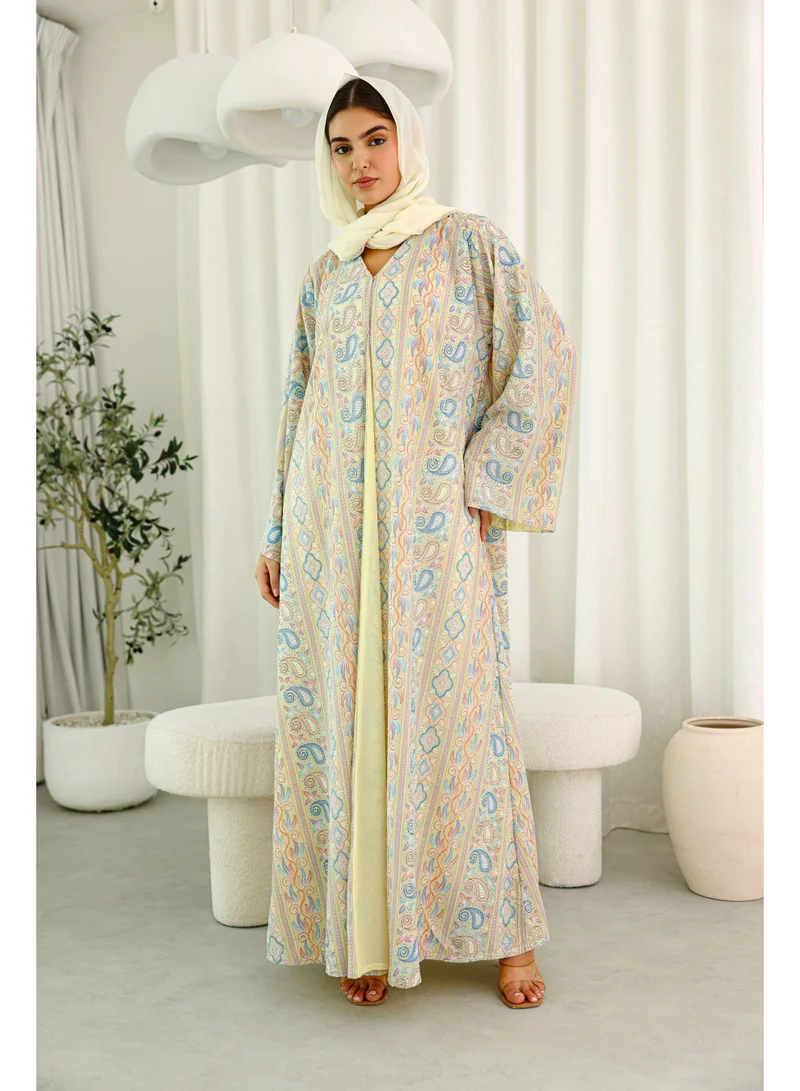 اكسا عباية قصة واسعة نقوش ربيعية اصفر