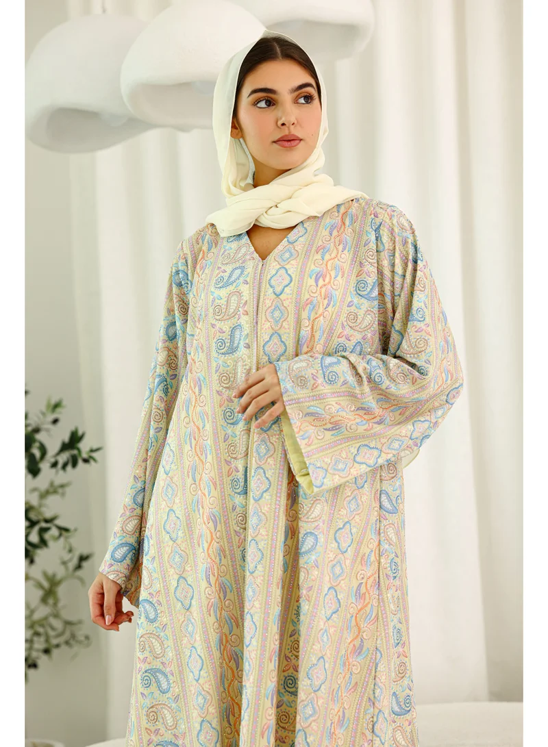 اكسا عباية قصة واسعة نقوش ربيعية اصفر