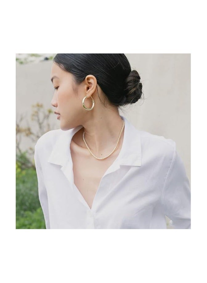 Fayrouz Jewellery 18 inch 18k tennis chain | A circular tennis necklace plated in white and yellow gold studded with cubic zirconia for women and men from Fayrouz Jewelry - Image 2