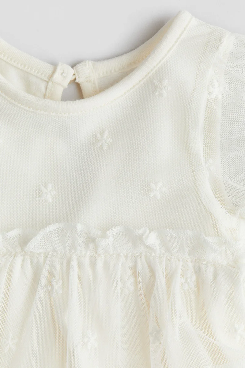 اتش اند ام فستان مطرز بتصميم بودي سوت