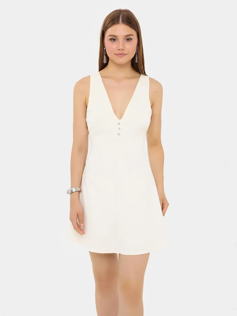 زوبعة فستان قصير قطني بياقة على شكل حرف  وفتحة وأزرار