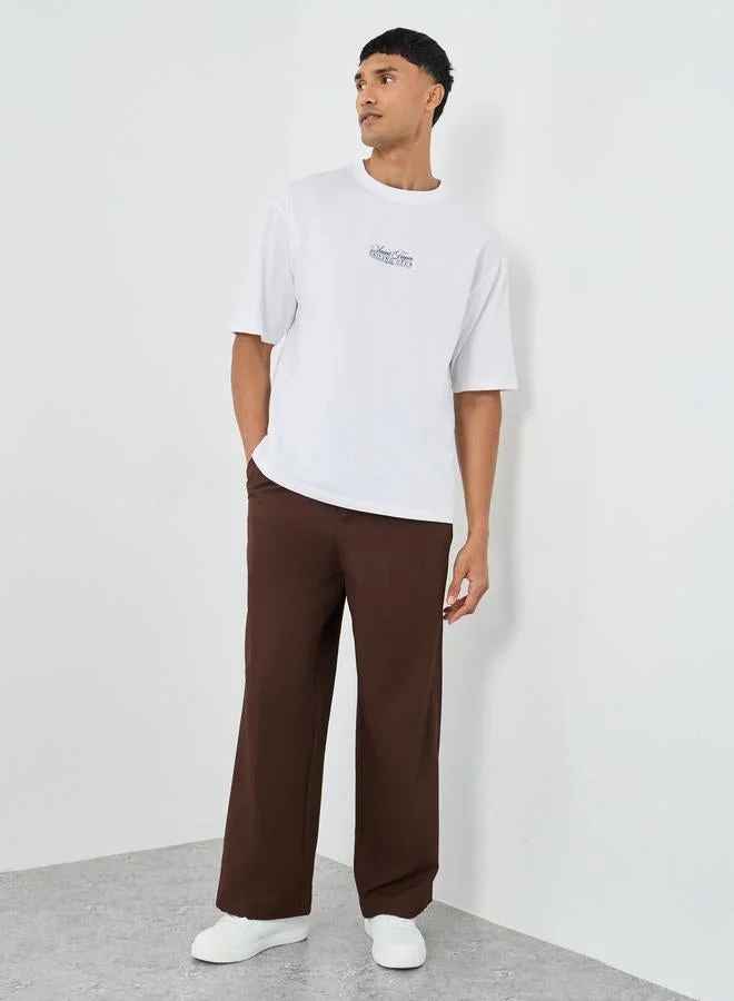 ستايلي تيشيرت فضفاض بياقة دائرية وطبعة جرافيك