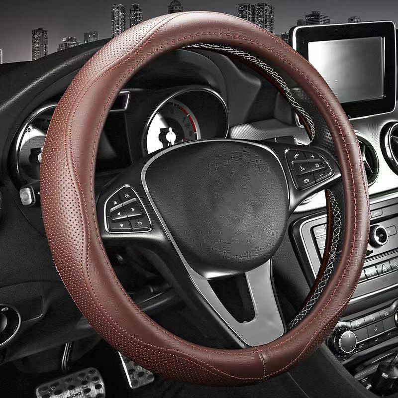 The entire steering wheel cover is made of cowhide, ensuring premium quality. - Image 2