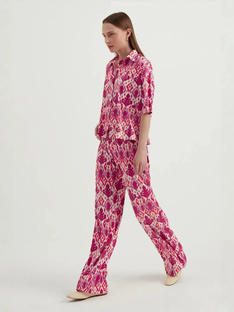 زوبعة سراويل بوهيمية عالية الخصر هندسية من الساتان