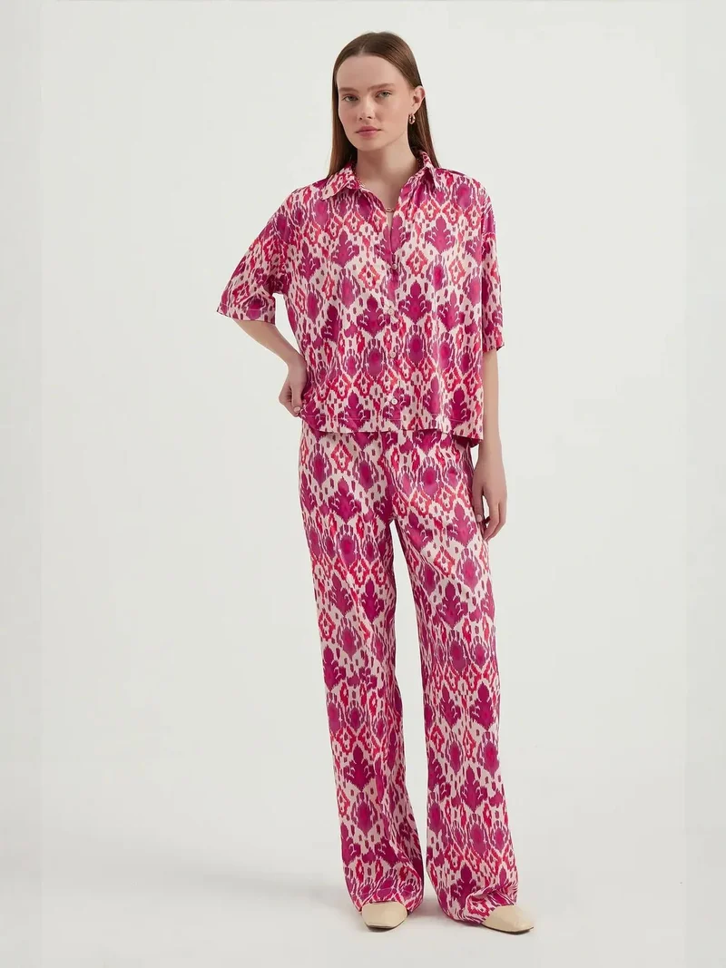 زوبعة سراويل بوهيمية عالية الخصر هندسية من الساتان