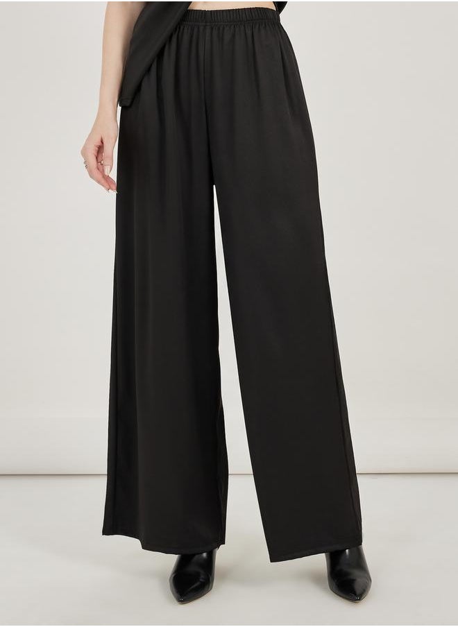 Styli - Self-Tie Belt Sleeveless Top and Wide Leg Pants Co-Ords - Image 1