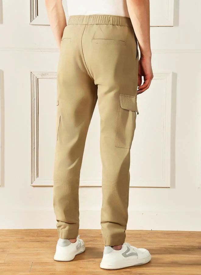 Dennis Lingo Slim Fit Khaki Men's Cotton Lycra Solid Cargo Trouser, Mid Rise, Full Length, Casual,