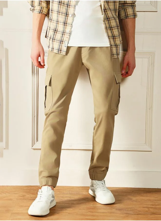 دينيس لينغو Slim Fit Khaki Men's Cotton Lycra Solid Cargo Trouser, Mid Rise, Full Length, Casual