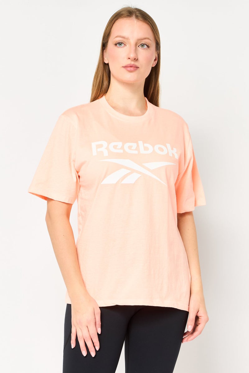Reebok Women Sportswear Fit Short Sleeve Outdoor T-Shirt, Peach - Image 1