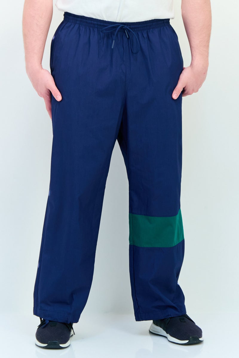 adidas Originals Men Loose Fit Outdoor Track Pants, Navy - Image 1