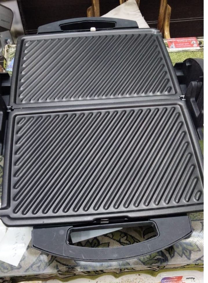 سينبو شواية جريل حجم كبير 2000 وات تركي بسطح مضلع من سينبو العمل على الوجهين السطح مضلع سطح غير قابل للالتصاق الجزء العلوي من الجسم يفتح 180 درجة تحكم في درجة الحرارة تناسب اللحوم و الاسماك وغيرها من المشويات _اسود بضمان سنه - Image 2