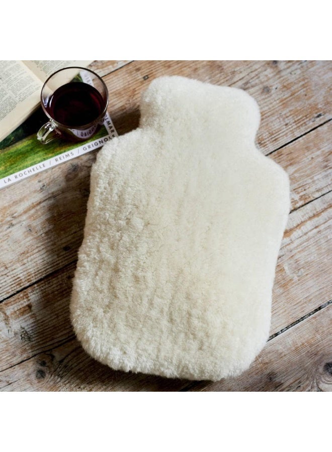 Red rubber hot water bottle - compact thermal bag with protective fabric cover - microwaveable and reusable for pain relief - Image 2