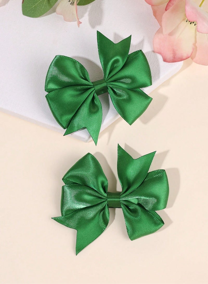 زينة اليوم الوطني مشابك شعر بتصميم فيونكه باللون الأخضر مناسبة لليوم الوطني السعودي والحفلات -قطعتين من مشابك شعر مناسب لليوم الوطني السعودي - Image 1