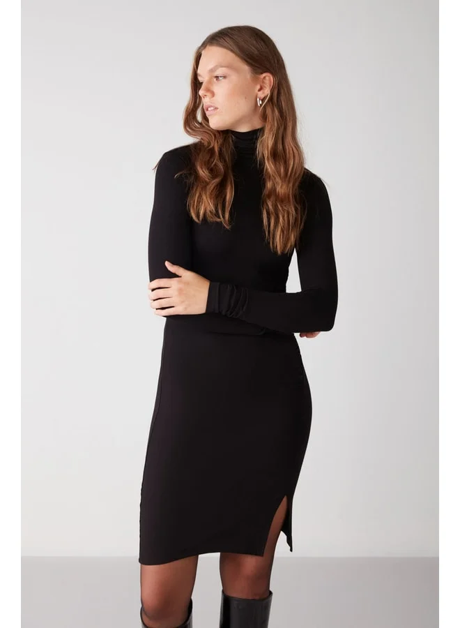 Ethiquet Ingrid Women's Flexible Viscose Fabric Draped Neckline Slit Body-Hugging Black Dress.