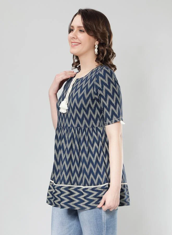 KASYA Blue Ikat Print Short Sleeve Peplum Top