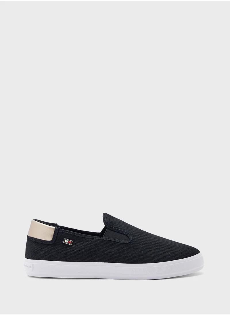 TOMMY HILFIGER VULCANISED CANVAS SLIP ON TRAINERS