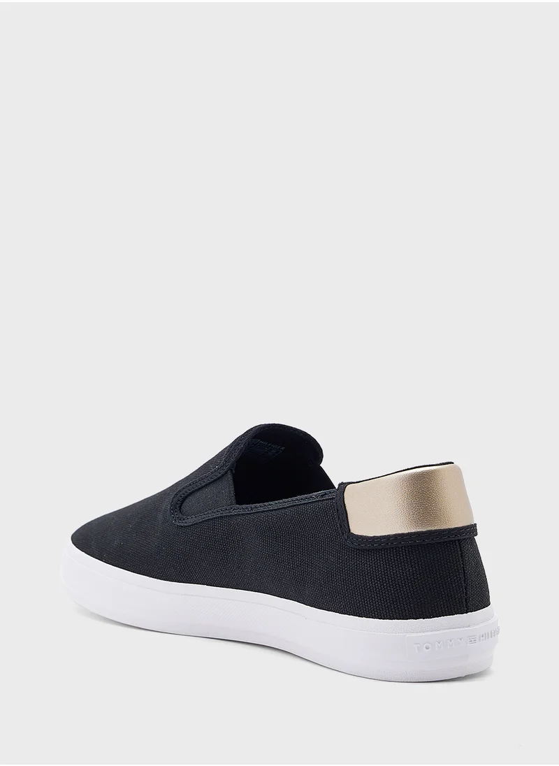 TOMMY HILFIGER VULCANISED CANVAS SLIP ON TRAINERS