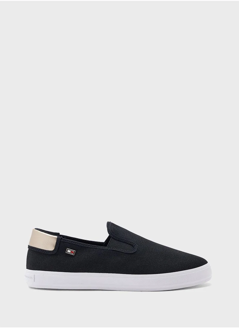TOMMY HILFIGER VULCANISED CANVAS SLIP ON TRAINERS