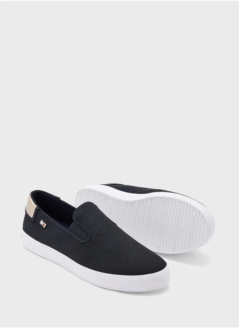 TOMMY HILFIGER VULCANISED CANVAS SLIP ON TRAINERS