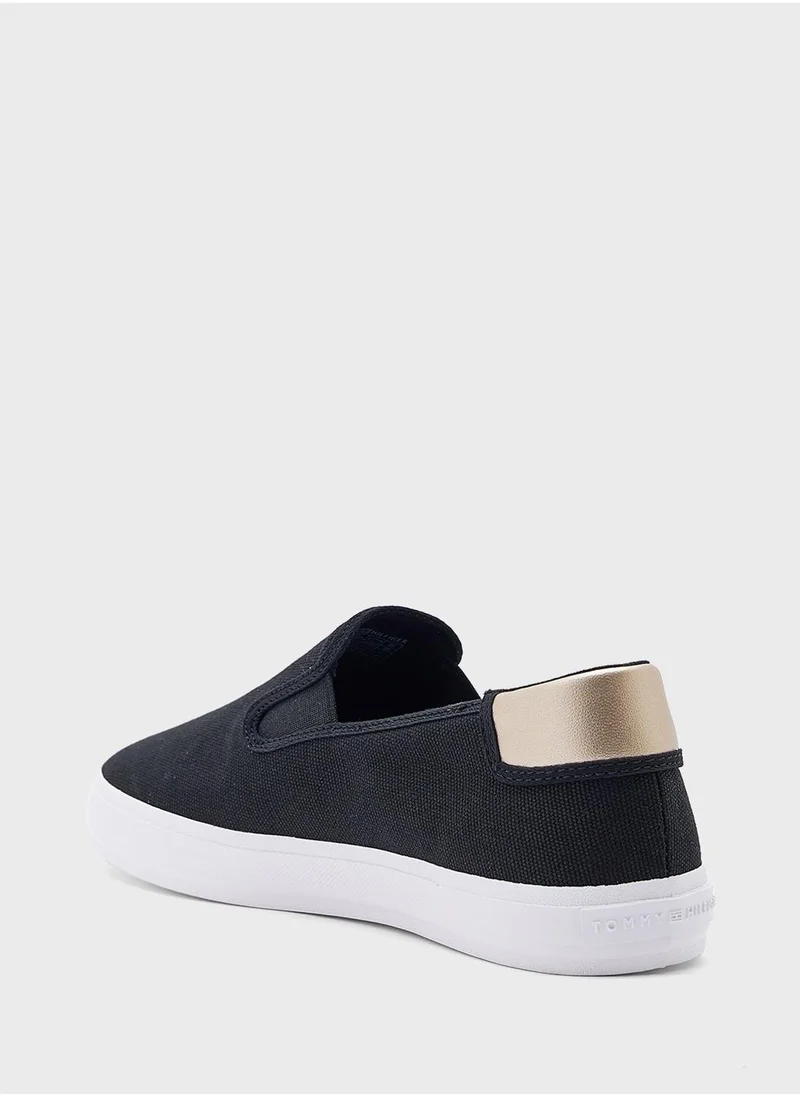 TOMMY HILFIGER VULCANISED CANVAS SLIP ON TRAINERS