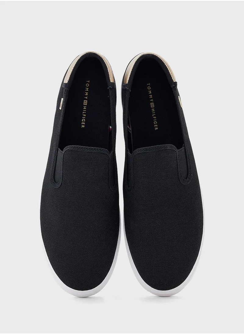 TOMMY HILFIGER VULCANISED CANVAS SLIP ON TRAINERS