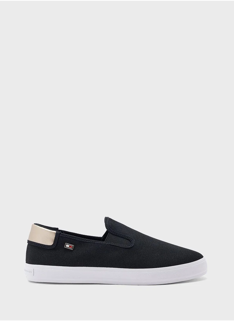 TOMMY HILFIGER VULCANISED CANVAS SLIP ON TRAINERS