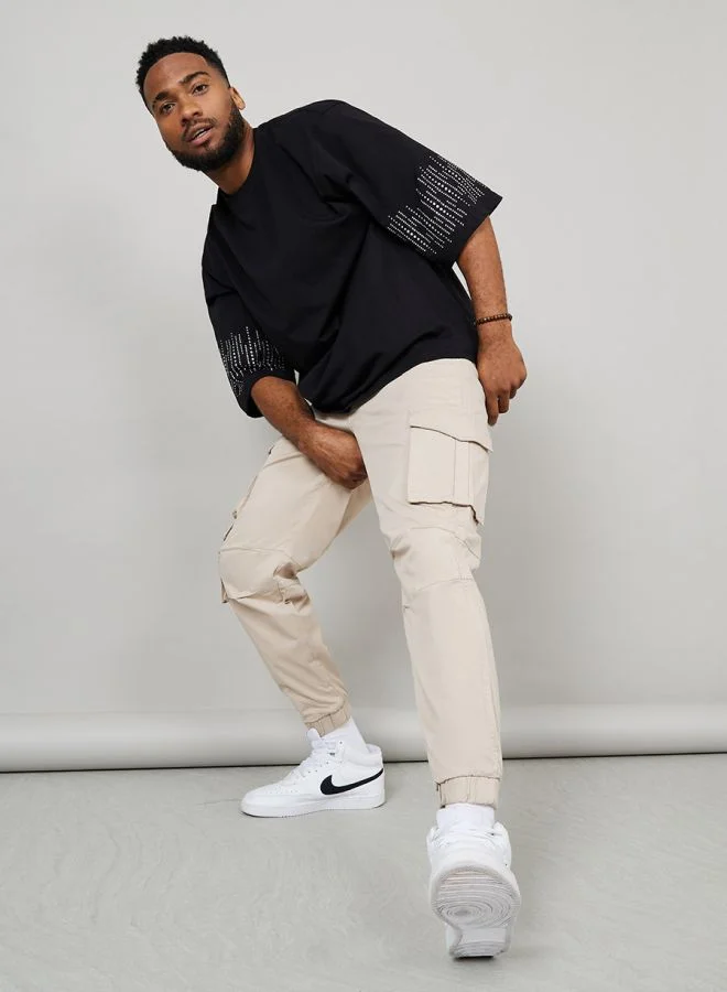 Styli Relaxed Fit Tapered Cargo Jogger in Cotton Twill