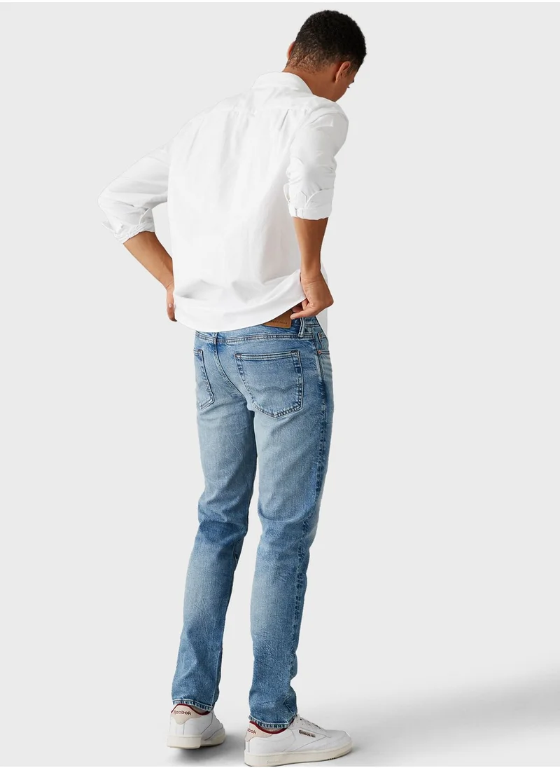 امريكان ايجل Mid Wash Slim Fit Jeans