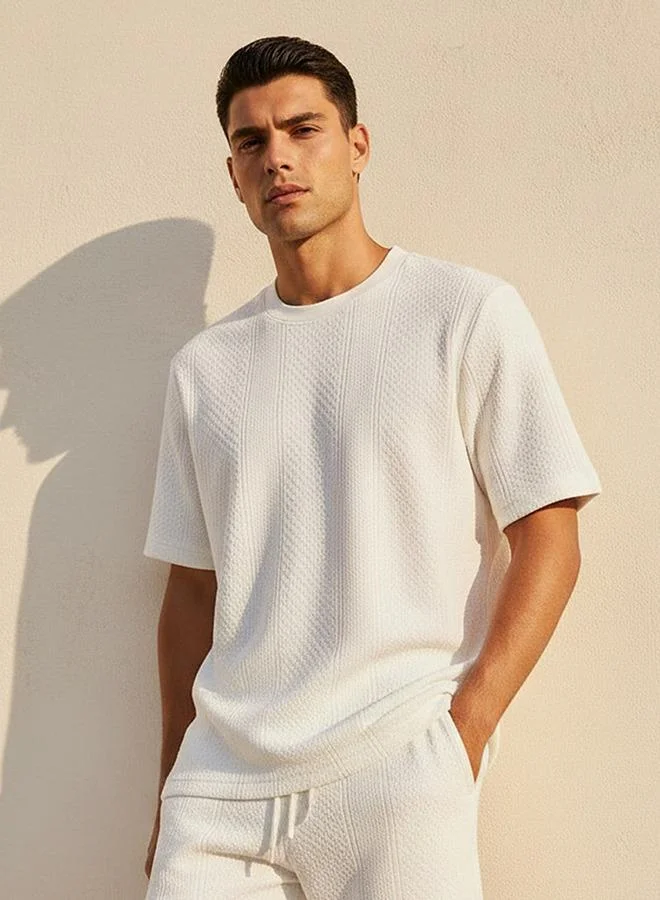 ايكونيك Iconic Men Regular Fit Crew Neck Short Sleeves Textured T shirt