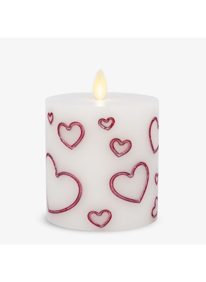 LUMINARA Pearl Ivory Flameless Moving Flame Candle Debossed Hearts Pillar with Metallic Raspberry Hearts Flameless LED Candle 3.4" x 4.5" - Image 1