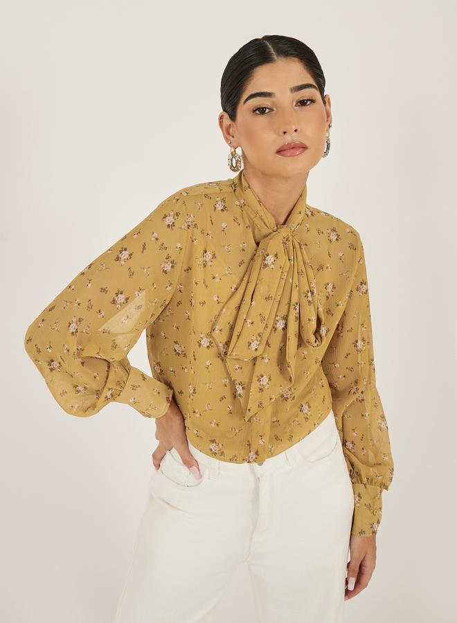 Styli Floral Print Textured Tie-Up Neck Blouse - Image 1