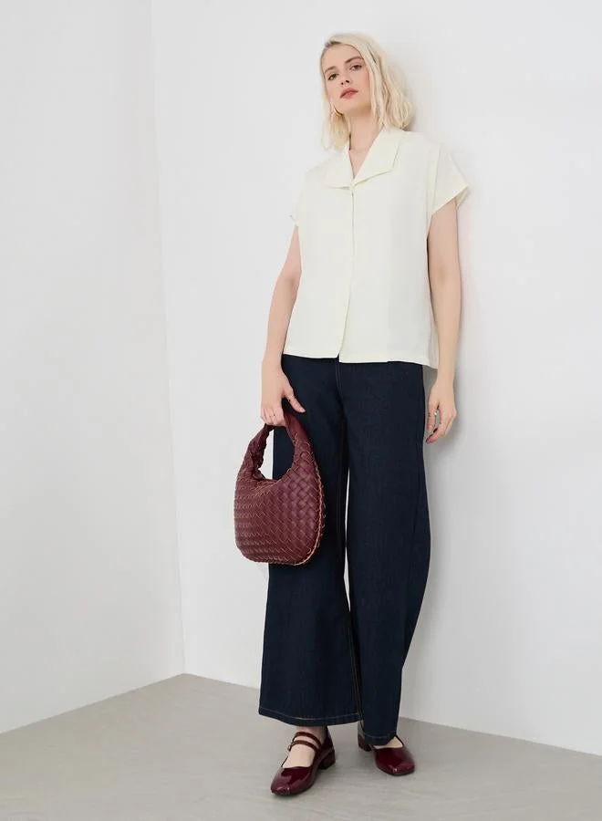 تايك تو قميص بأزرار سادة مقاس كبير