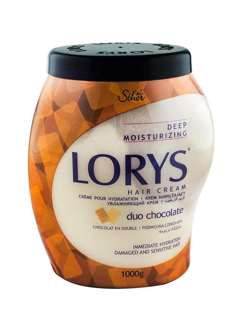 Duo Chocolate Deep Moisturizing Hair Cream 1000gmsProduct Name: Lorys Duo Chocolate Deep Moisturizing Hair Cream (1000g)Target Hair Type: Best for chemically treated, mechanically damaged, dry, and sensitive hair.Core Active Ingredients: Rich cocoa/chocolate extracts, protective silicones, and strengthening keratin.Main Benefits: Reduces split ends, improves combing manageability, repairs structural strand damage, and adds noticeable shine