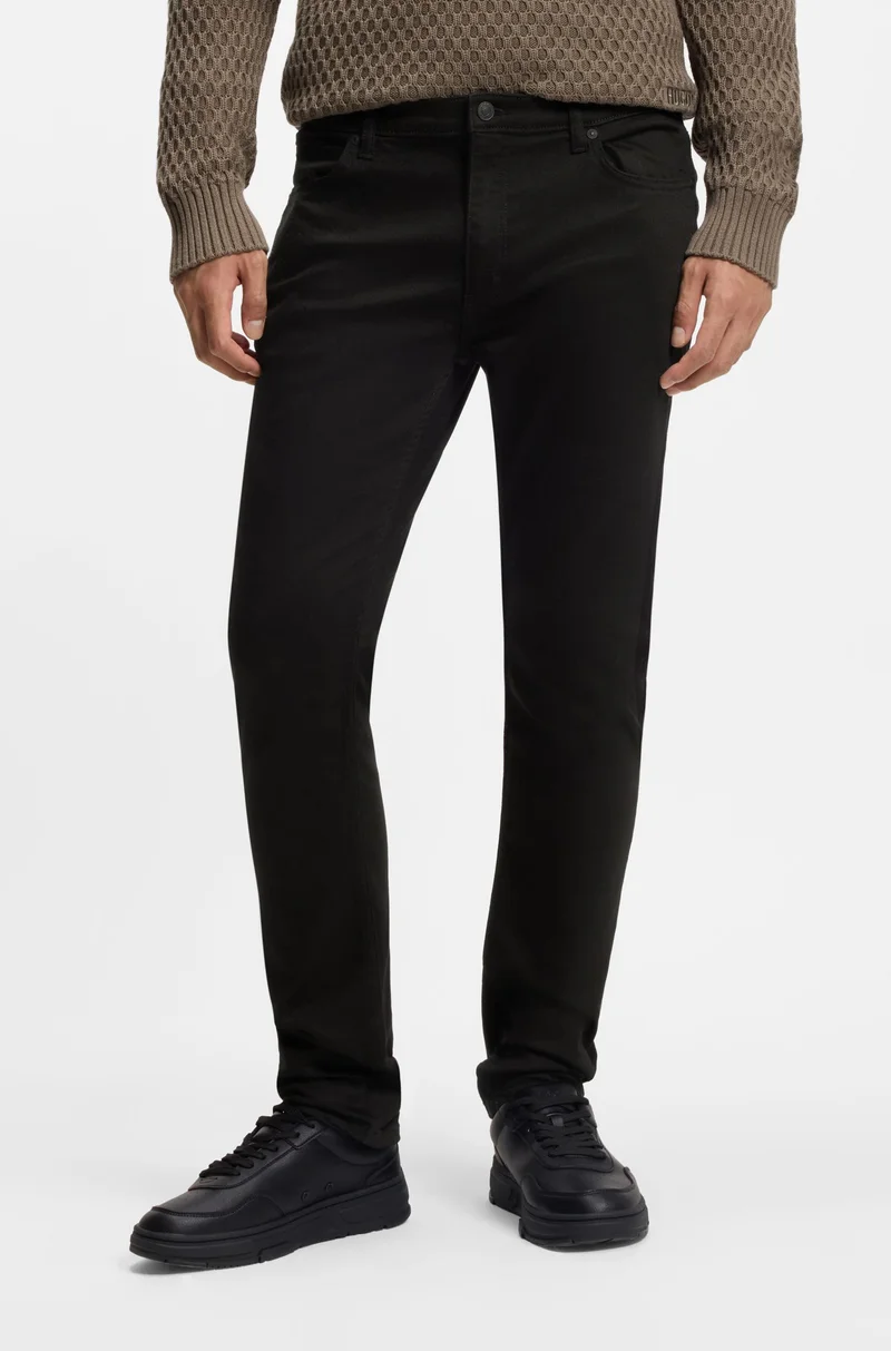 هوجو جينز نحيف للغاية بلون أسود فائق من قماش دينم مطاطي