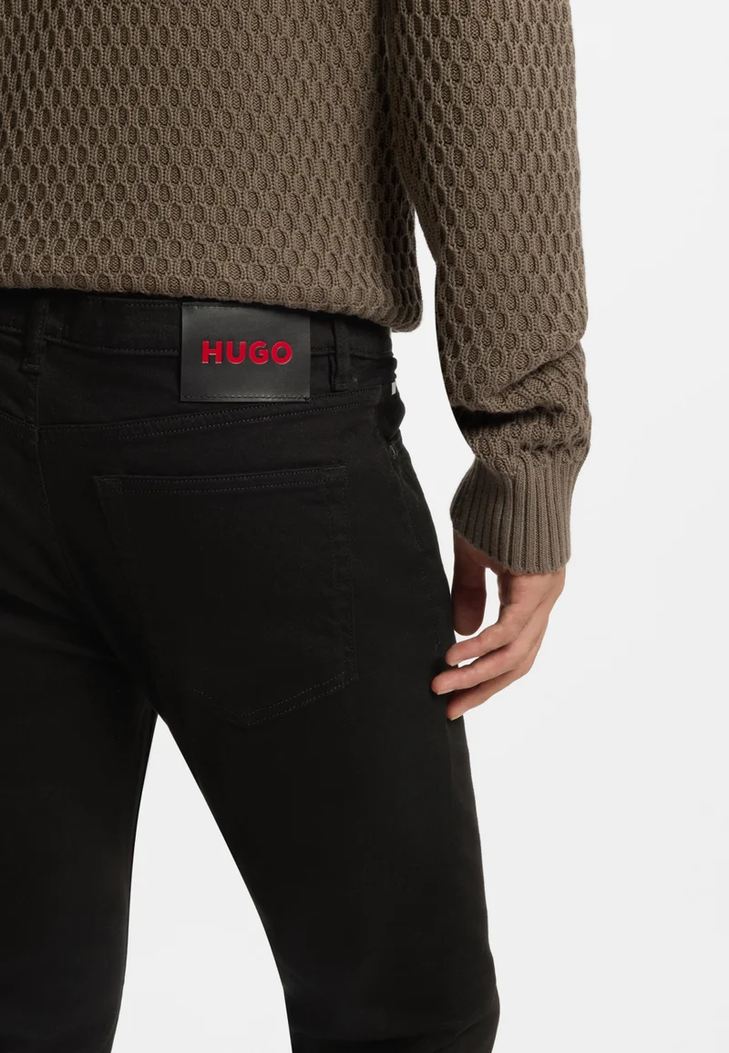 HUGO Black Extra-slim-fit jeans in black-black stretch denim for Men | Best Price UAE