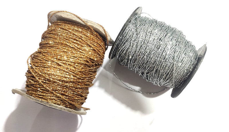 OMX 1mm, 100 Mtr Silver, 100 Mtr Gold, Total 200 Mtr, 2 Rolls, Glitter Shimmer Mettalic Zari Thread for Embroidery, Sewing and Jewelry Making, Polyester for Metallic Strip & Cotton Yarn Inside. - Image 1