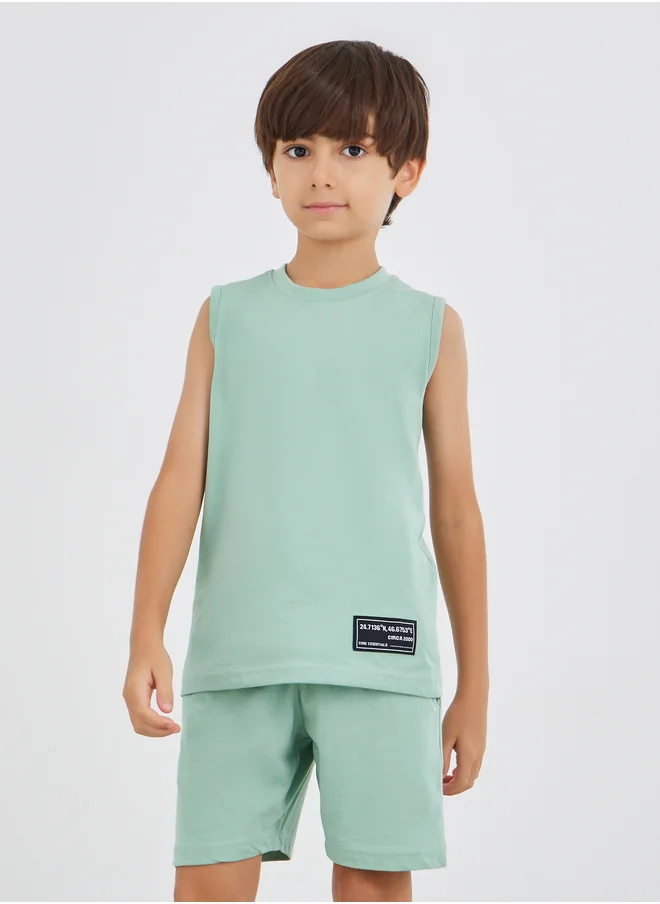 Styli Styli Solid Badge Detail Sleeveless T-Shirt and Shorts Set