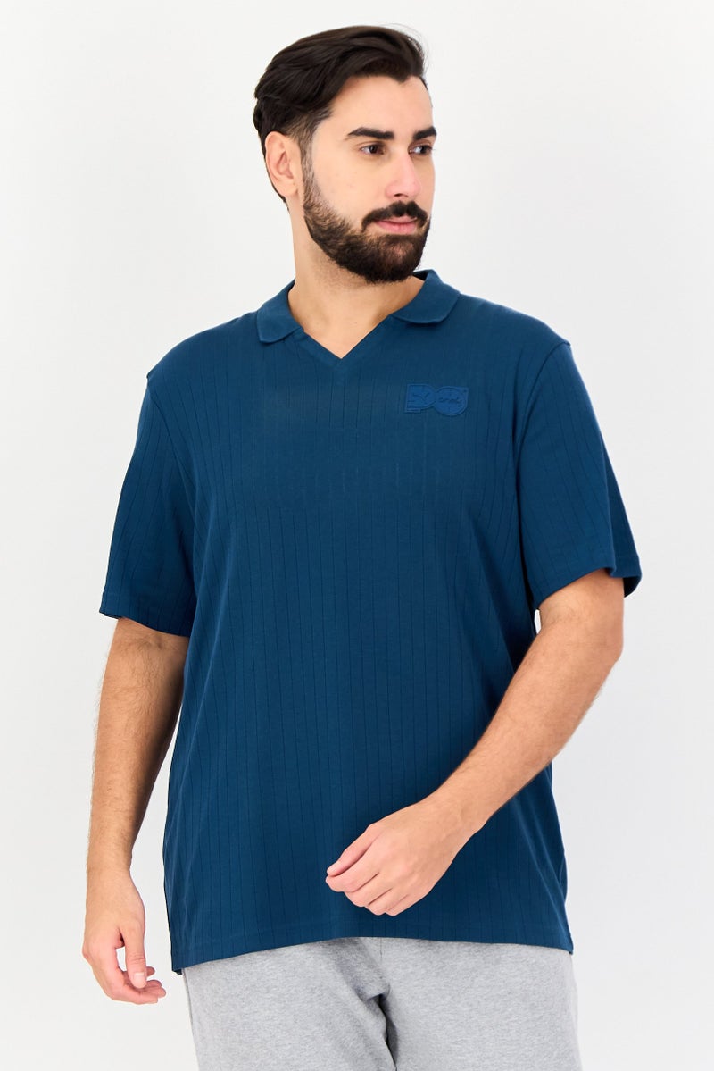 Puma x One8 Men Sportswear Fit Short Sleeves Outdoor Polo Shirt, Dark Teal Blue - Image 1