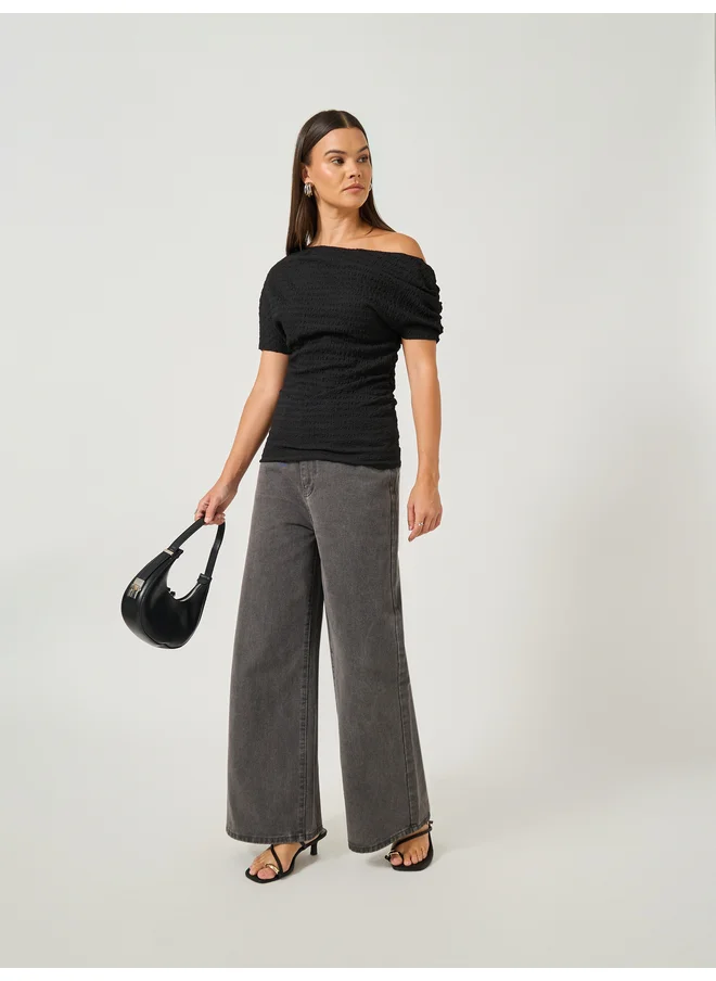 Styli Styli Women Black Textured Asymmetric Neck Knit Top