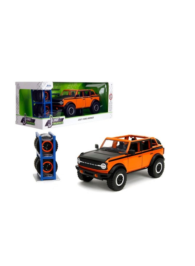 Jada Toys Just Trucks 1:24 2021 Ford Bronco Die-Cast Car & Tire Rack, Toys for Kids and Adults(Orange) - Image 1