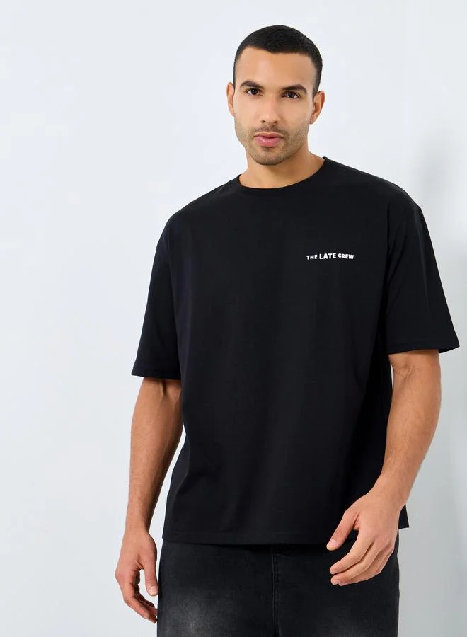 Styli Styli Men Black Oversized Printed Jersey T-Shirt