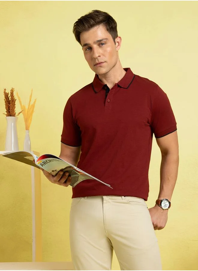 Dennis Lingo Cabernet Maroon Regular Fit Polo T-Shirt for Men, designed with a classic polo neckline and contrast inner details – a refined addition to any modern wardrobe.