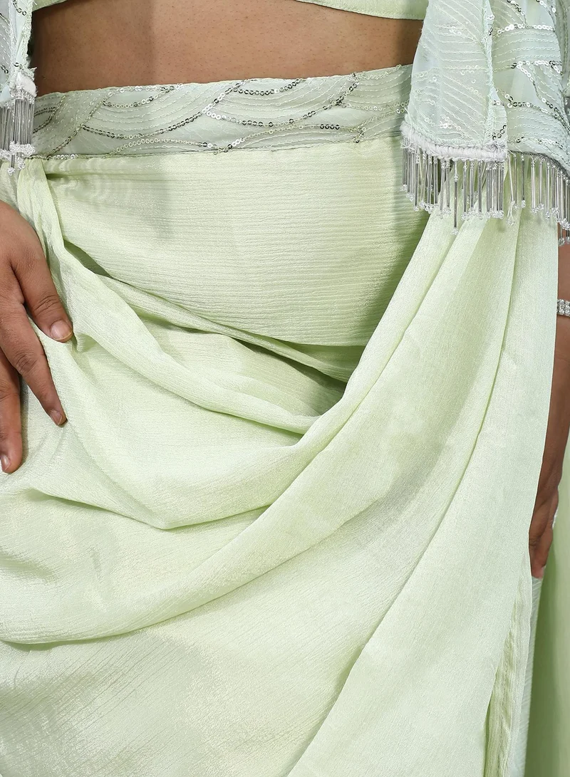 Instafab Plus Instafab Plus Women's Sage Green Bijou Cape Pre-Draped Saree For Casual Wear | V-Neck | Half Cape Sleeves | Plus Size 1 Piece Pre-Draped Saree Designed With Comfort Fit For Everyday Ethnic Wear