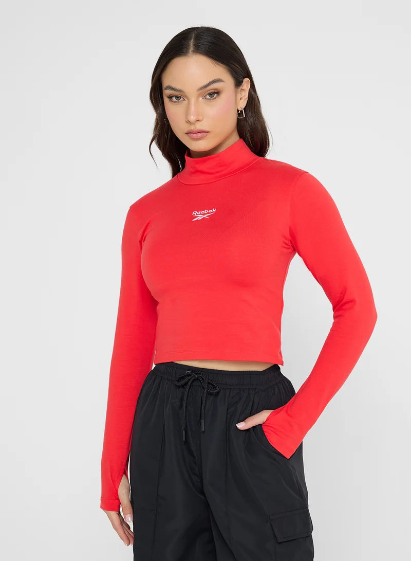 ريبوك Jade Roll Neck Slim Croped T-Shirt